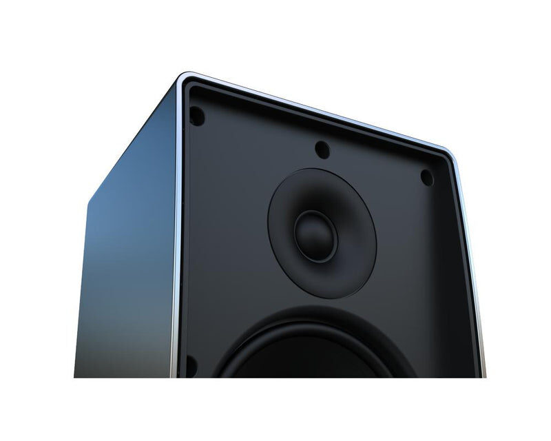 Close-up of a black speaker box with a circular speaker cone